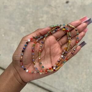 Small multicolored beaded African anklets from Ghana